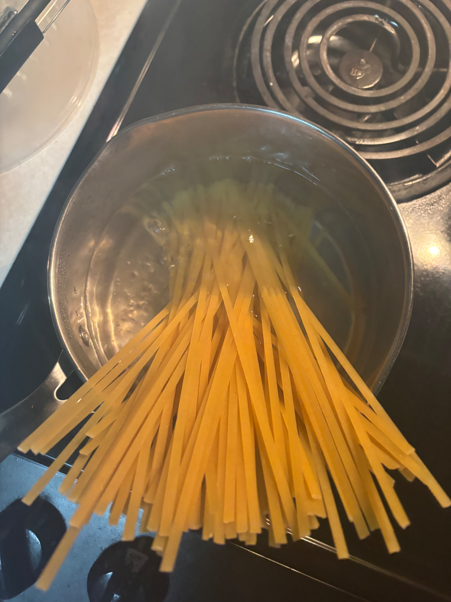 Fettuccine going in — even the comfort foods earn their place at a Peaceology table.