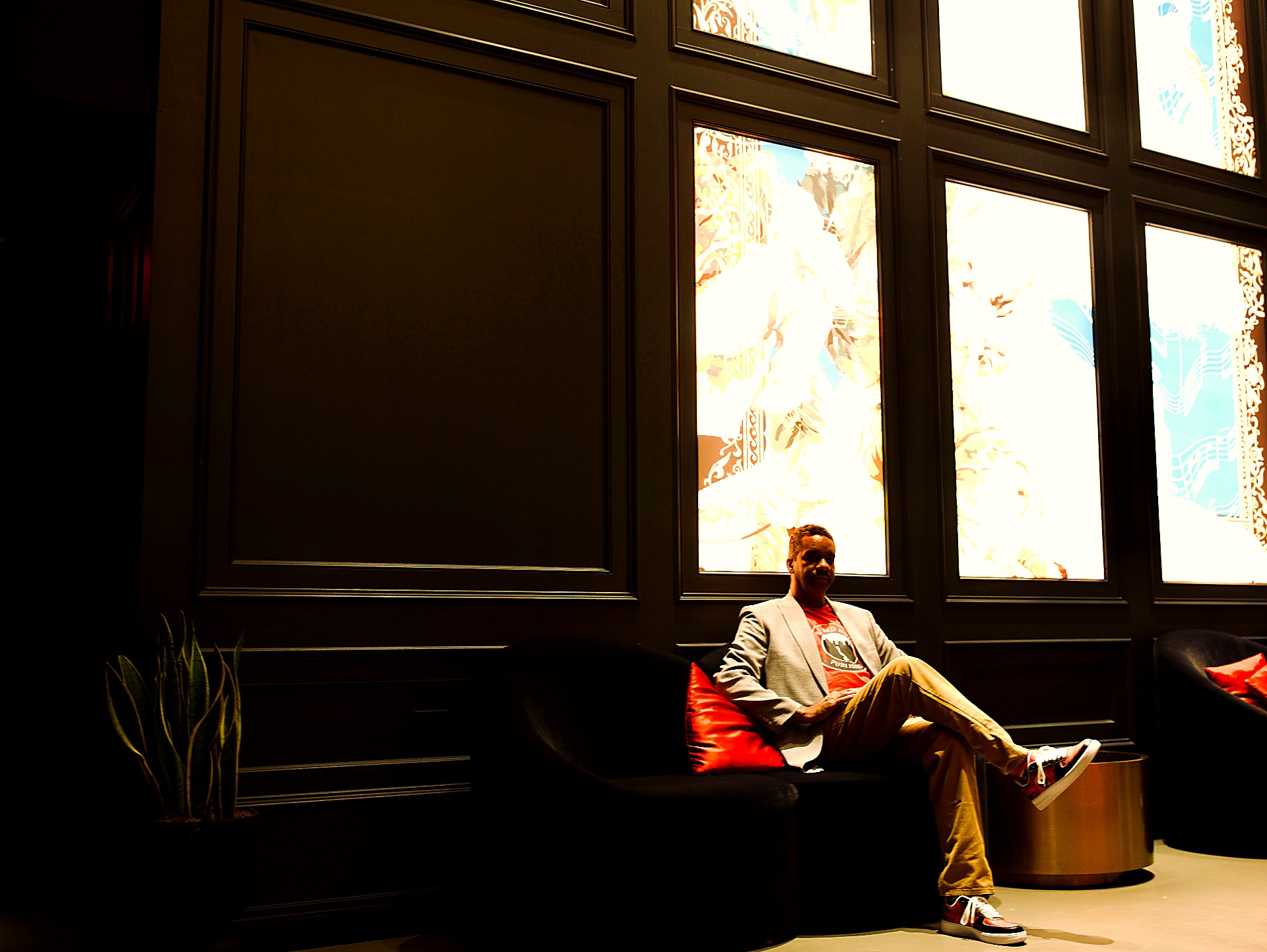 Cyril Darensbourg seated in the lounge at The Box Studios in New Orleans