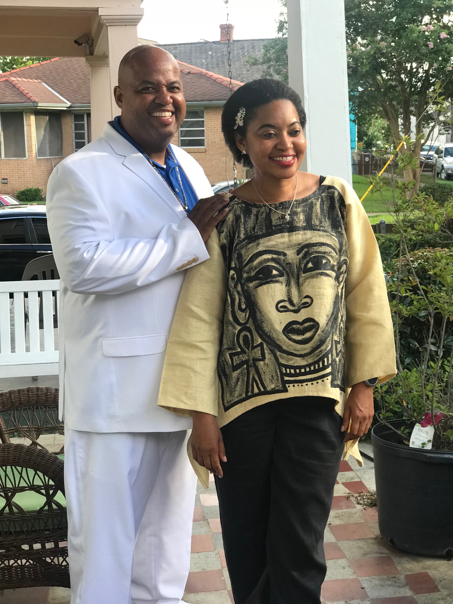 Dr. Stephanie Jupiter with Byron Jupiter on a New Orleans porch