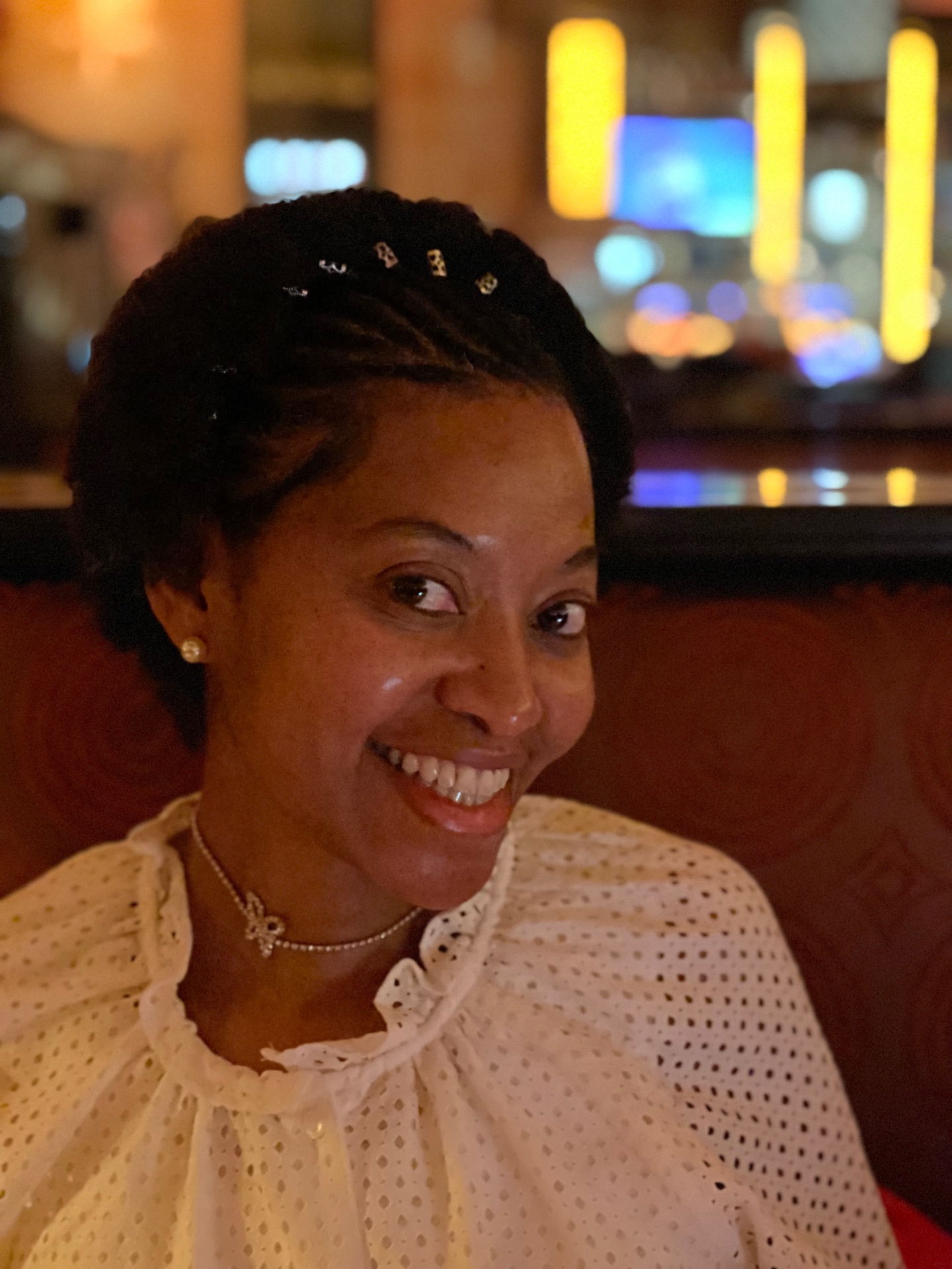 Close portrait of Dr. Stephanie Jupiter smiling in warm light